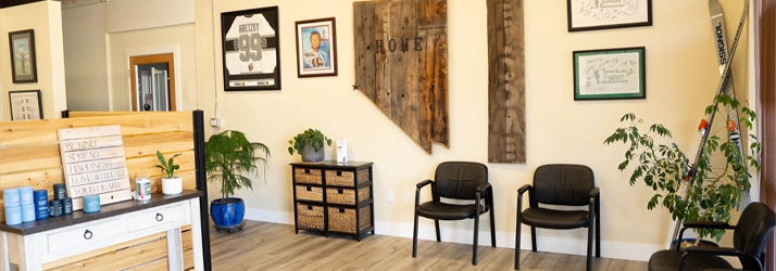 Chiropractic Clinic Reception Area Featuring Comfortable Guest Seating